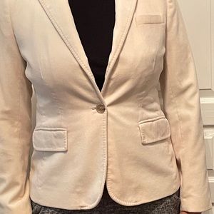 Cream colored, velvet blazer.